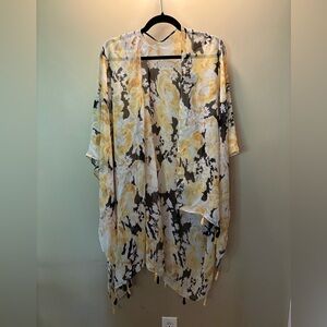Sheer light weight yellow and black Shaw shirt sleeve
